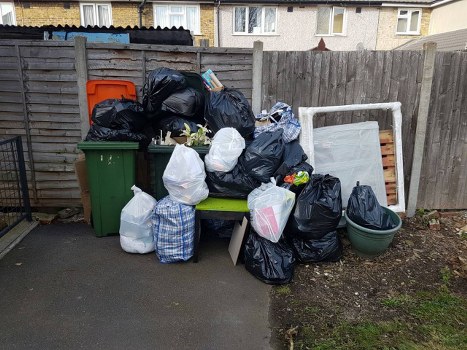 Professional home clearance team in Wimbledon removing furniture