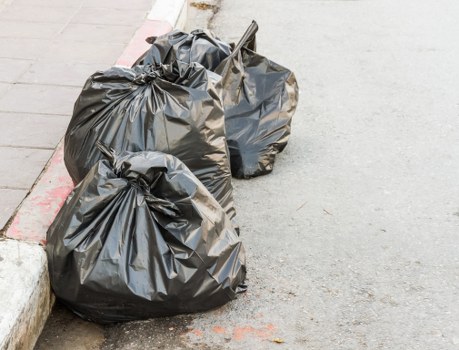 Variety of business waste types including paper and electronics
